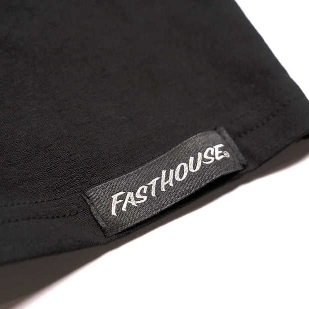 fasthouse-label-on-mens-black-tank-top