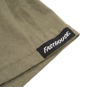 fasthouse-label-on-green-tshirt