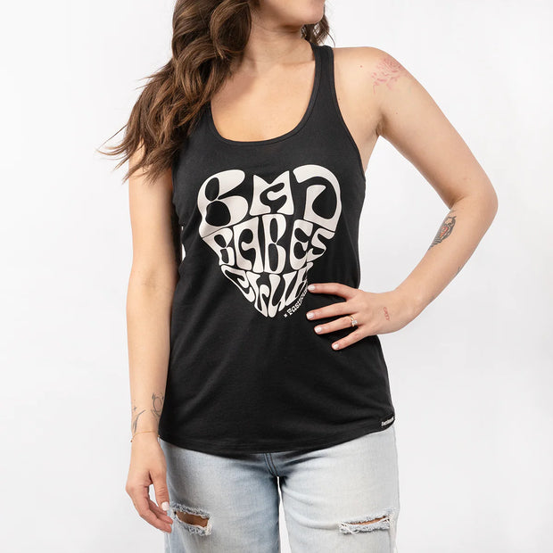 woman-wearing-black-tank-top-with-white-font-on-front