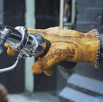bronze-leather-motorcycle-gloves-with-MotoStuka-branding-on-thumb
