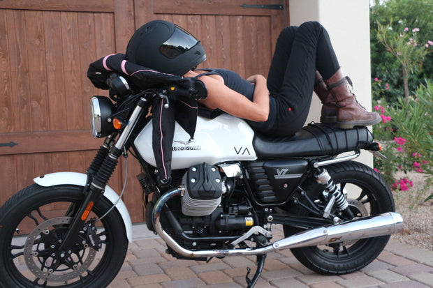 women-wearing-black-leggings-sitting-on-motorcycle